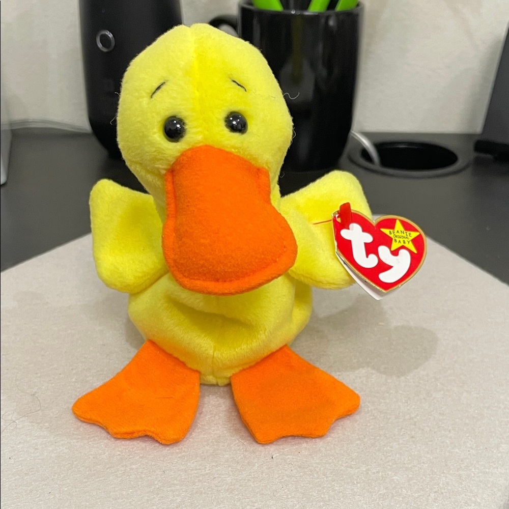 Ty Yellow Duck Plush with Orange Beak & Feet “Quackers” born in 1993.